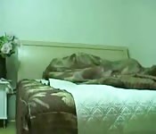 Hard amateur sex on a bed in a bedroom