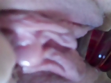 using my glass dildo and rubbing my big clit
