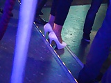 Candid dancing white high heels in a club