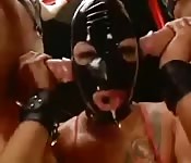 Abusing the mouth of a masked woman