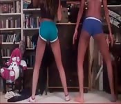Two amateur teens in tight shorts working the twerking