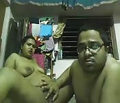 Old Indian couple play online