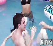 Orgy sex in the pool
