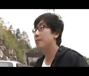 Asian brunette rides cock in public