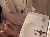 Cute girl masturbates in bathroom