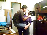 Woman carries her boy toy and kisses him