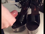 Slow Motion Cumshot on Black Heels