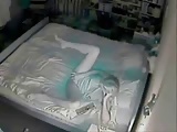 My mum masturbating on bed .Hidden cam