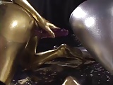 Gold and Silver Painted lesbians fisting each other