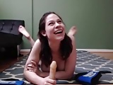 Playing with her dildo