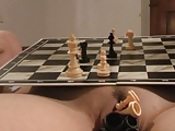 chess match on naked body