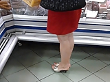 Candid Mature Feet in pums at the store