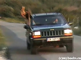 Aneta Buena with Kora on trip in Jeep