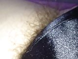 pubic hairs sticking out of her sexy black silk pantys.