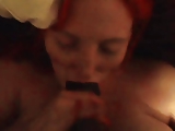 Busty redhead sucking big black cock