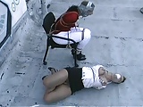 two women bound tightly on roof