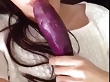 Amateur Asian sucks dildo