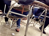 Candid feet flip flops on chair