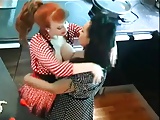 Redhead and Brunette Eat And Play On Kitchen Counter 