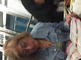 Blond mature upskirt in metro with face