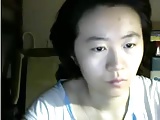 Plain looking Asian lady not shy to flash on cam