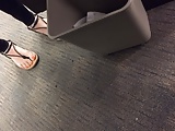 Sexy feet under table hidden camera