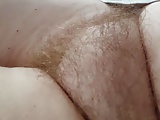 sneaky peak of her tired natural soft hairy pussy mound
