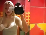 blond girl playing in bathroom