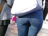 Candid redhead with peach ass in tight jeans