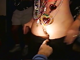 mardi gras flasher giving a lap dance