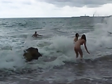 Threesome on beach