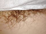 long pubic hairs hanging out from her white pantys,