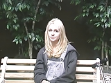 Petite blonde strips and masturbates on the bench