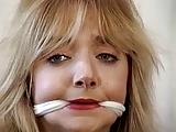 Cute blonde bound, gagged and teased by her master