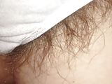  pubic hairs sticking out of the sides of her white pantys,
