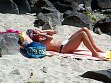 Oiling milf on Britanny beach