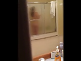 Aunt in the shower - door slightly opened