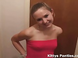 Cute Kitty in a tube top and tiny skirt