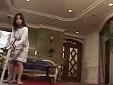 Asian Housewife serves her Husband when he gets Home