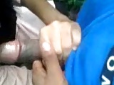 Rural area girl giving BJ in public