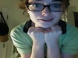 nerd looking slim teen strips on webcam