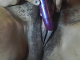 amature dark skin girl cums playing with chaos vibrater.