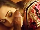 Sucks a long black dick