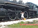 Hot MILF Fucks Herself With Dildo Next To Railroad Tracks