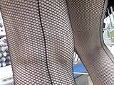 Seamed fishnet stockings in market