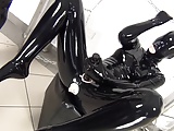 Two girls in latex catsuit fucks mutually