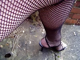 Fishnets tights close up and upskirt