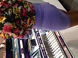 Sexy Asian in purple dress showing thong