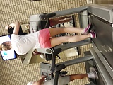 Hot blond girl on threadmill running with thong 