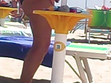 Spying MILF with big fat ass at beach